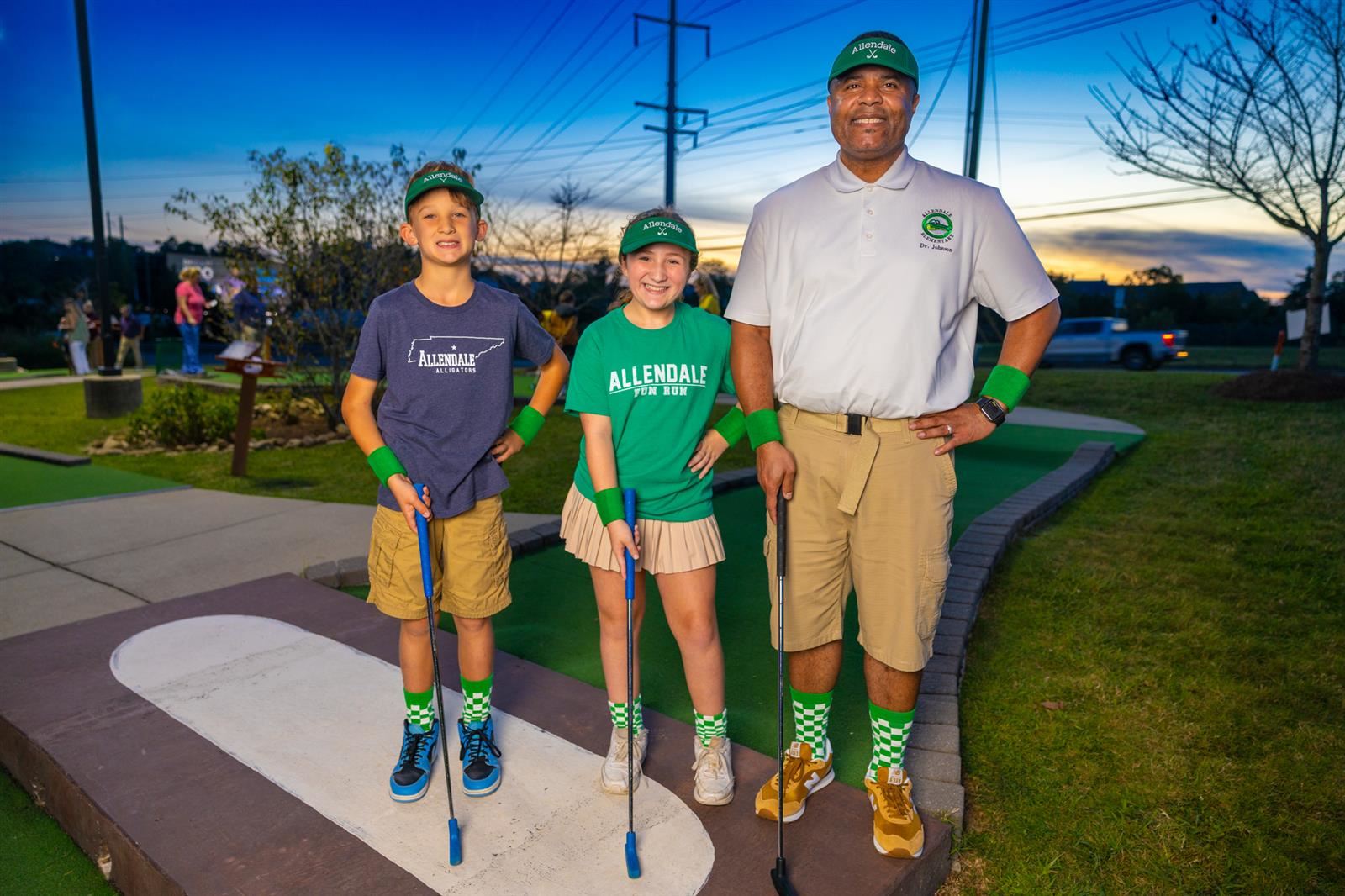Vice Principal and two students at Mini Golf